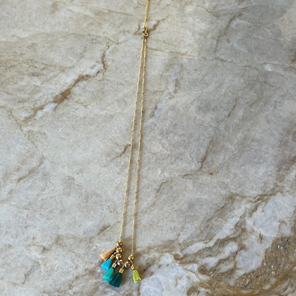 Elegant Gold Necklace with Blue and Green Accents
